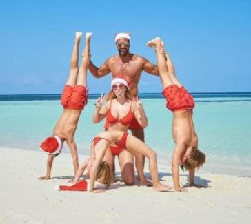 Rebecca Ellison husband Rio Ferdinand with their children and new spouse on the beach celebrating Christmas.